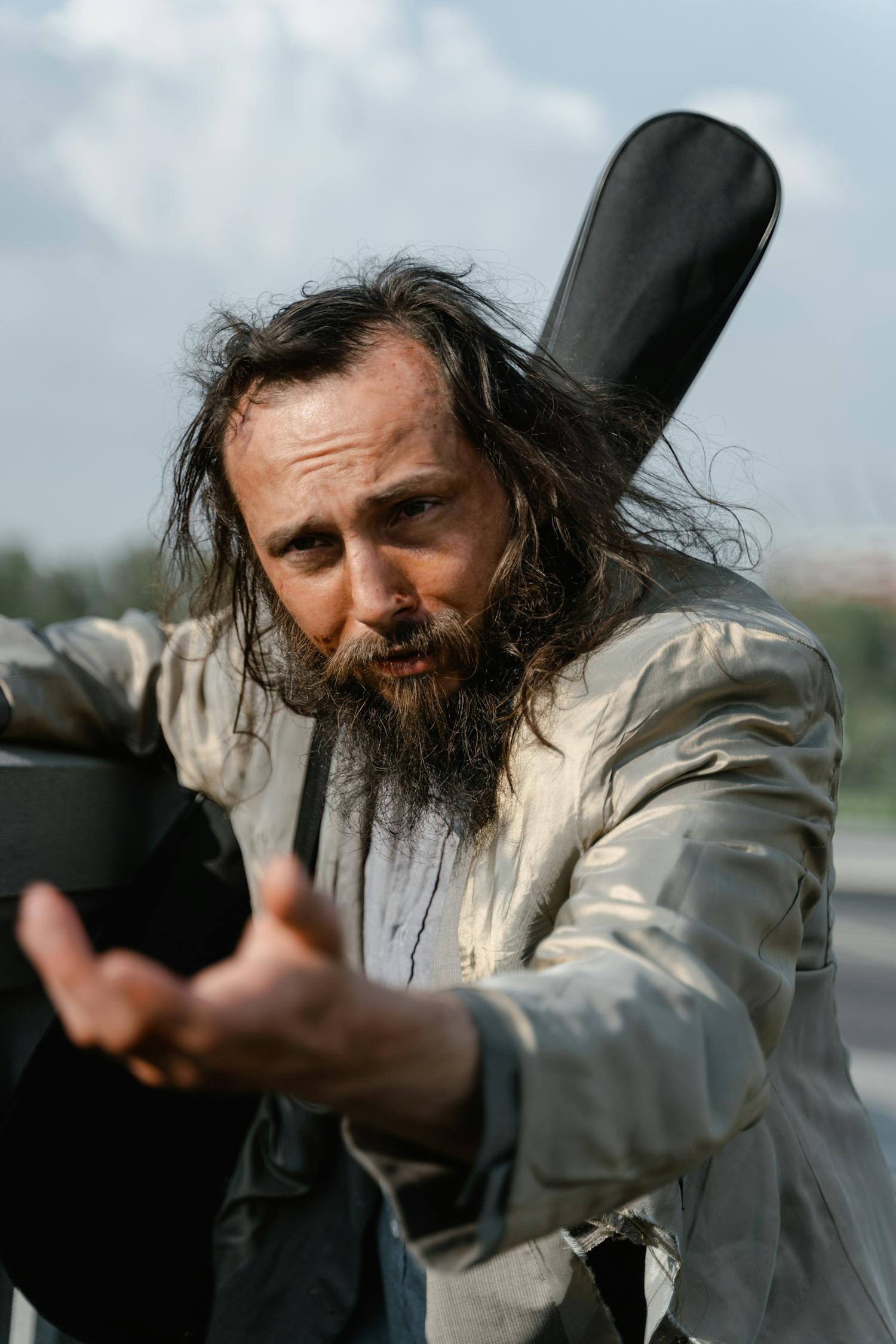 A Homeless Man Begging