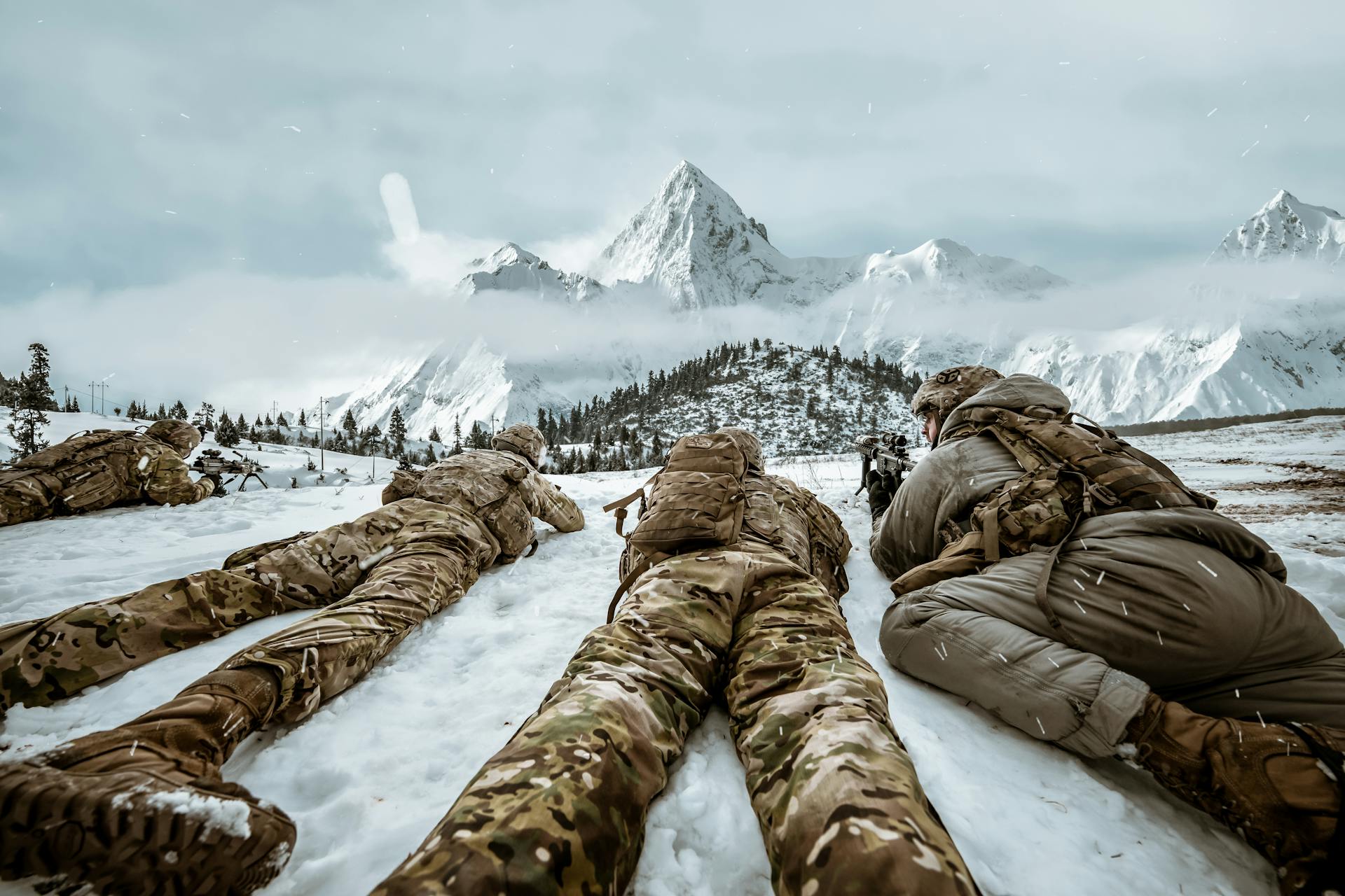 Soldiers in Prone Position on the Snow Covered Ground