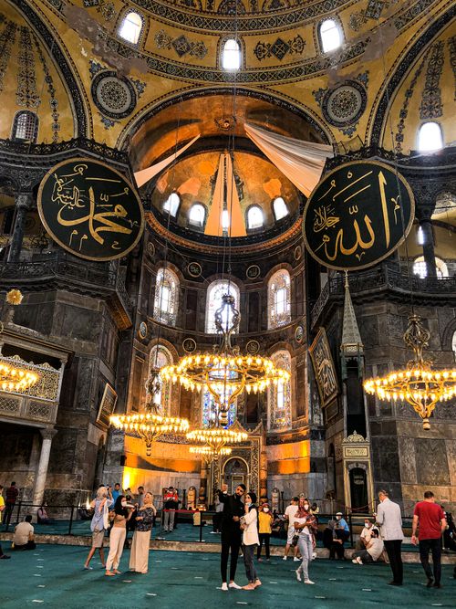 Free Stunning view of Hagia Sophia's ornate interior featuring historic Islamic calligraphy and architecture. Stock Photo