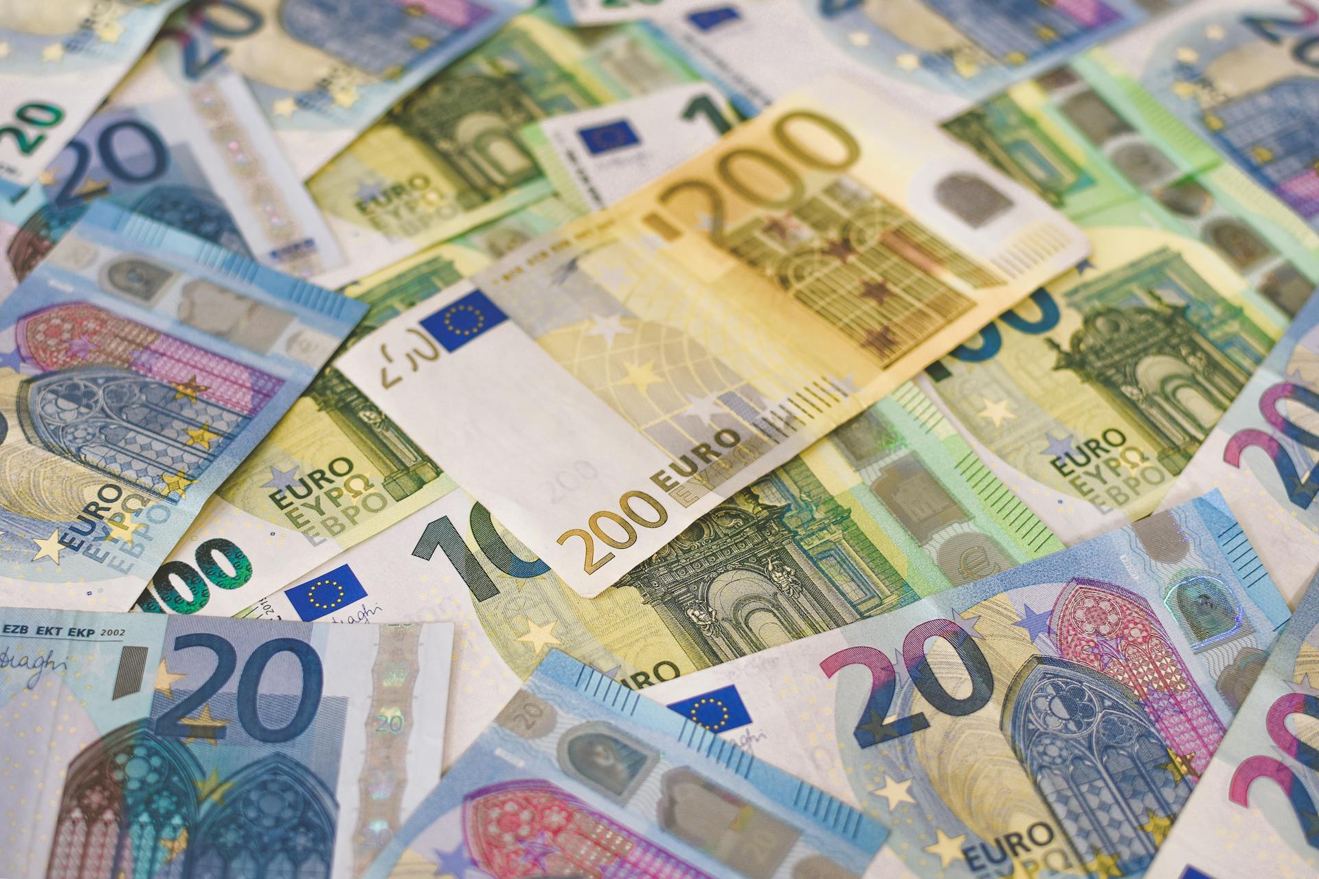 Colorful assortment of Euro banknotes in various denominations, signifying wealth and finance.