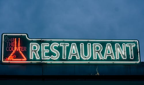 Green and White Restaurant Neon Signage