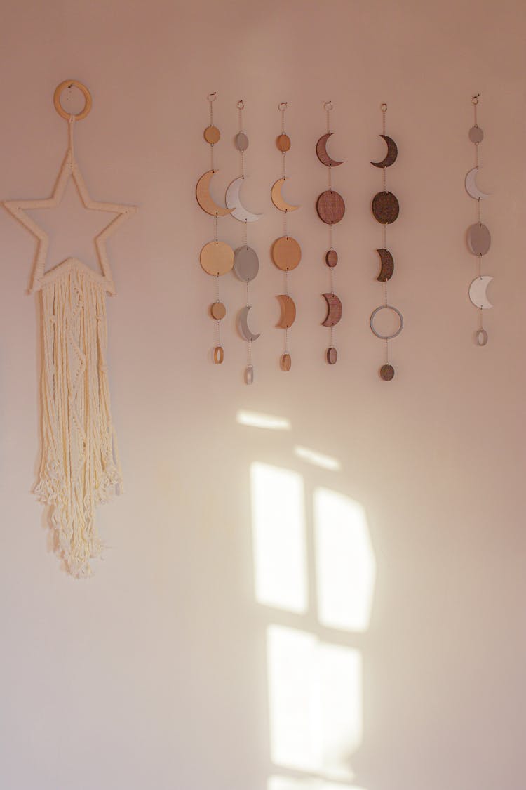 Moon And Star Shape Decorations On A Wall