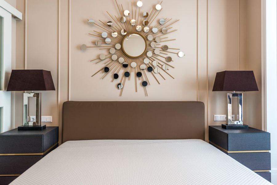 Feng shui bedroom with symmetrical matching nightstands and lamps on both sides of the bed for balanced energy
