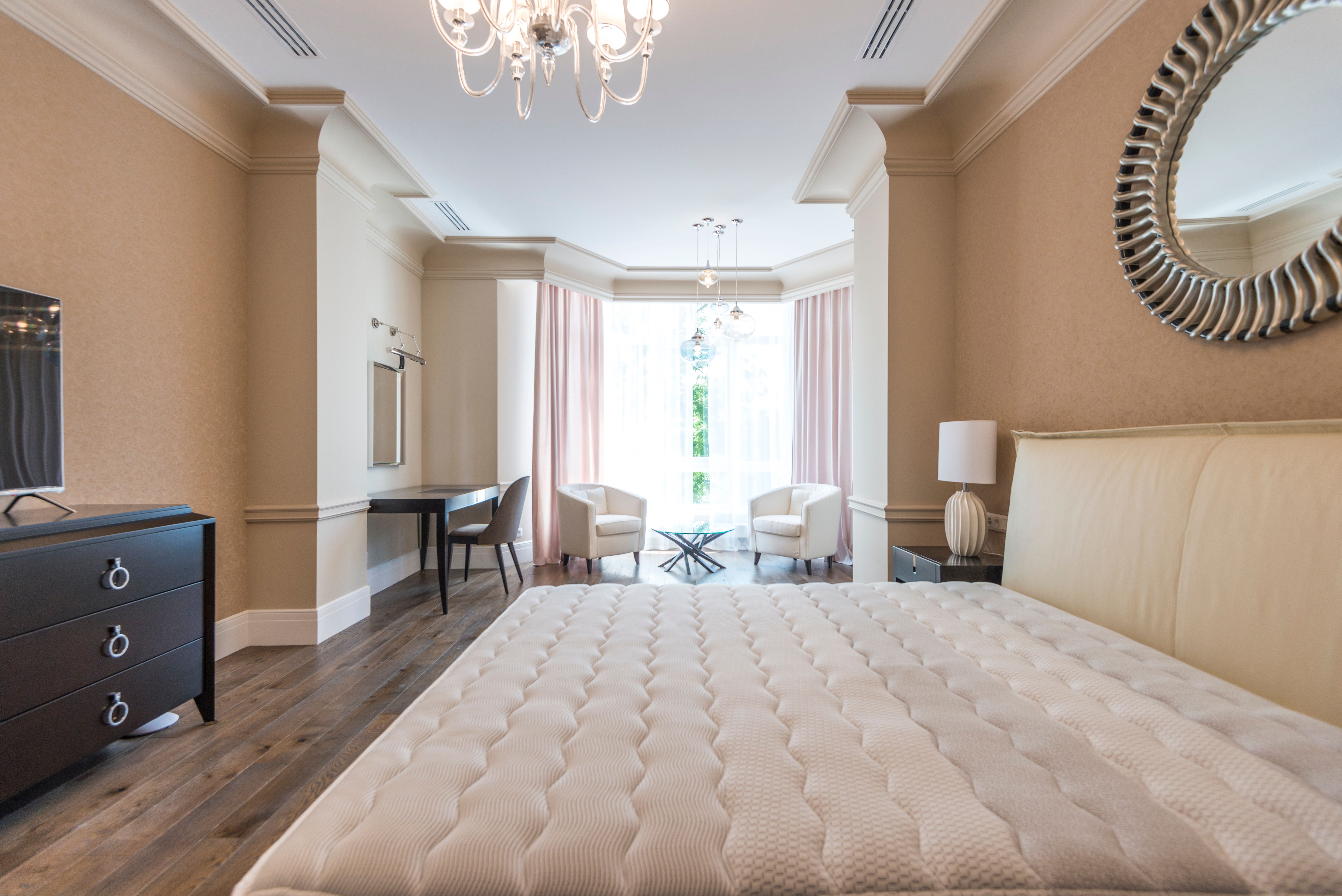 Cozy and clean bedroom interior with natural light, no people