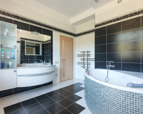 Black white tile shower design