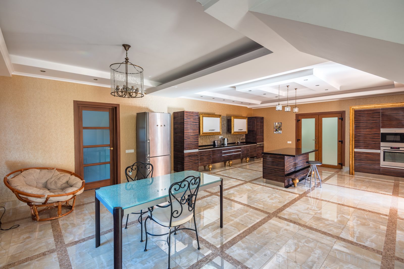Renovated open-plan kitchen and dining area with natural light