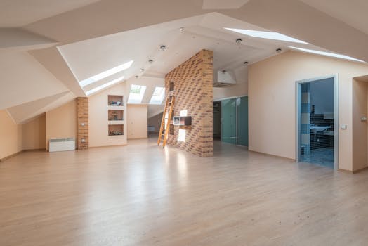 Explore this bright, spacious modern attic apartment with skylights and contemporary design.