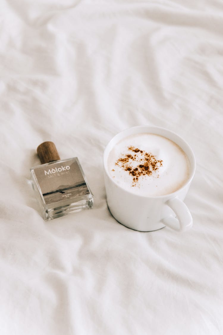 Perfume Vial And Coffee Cup