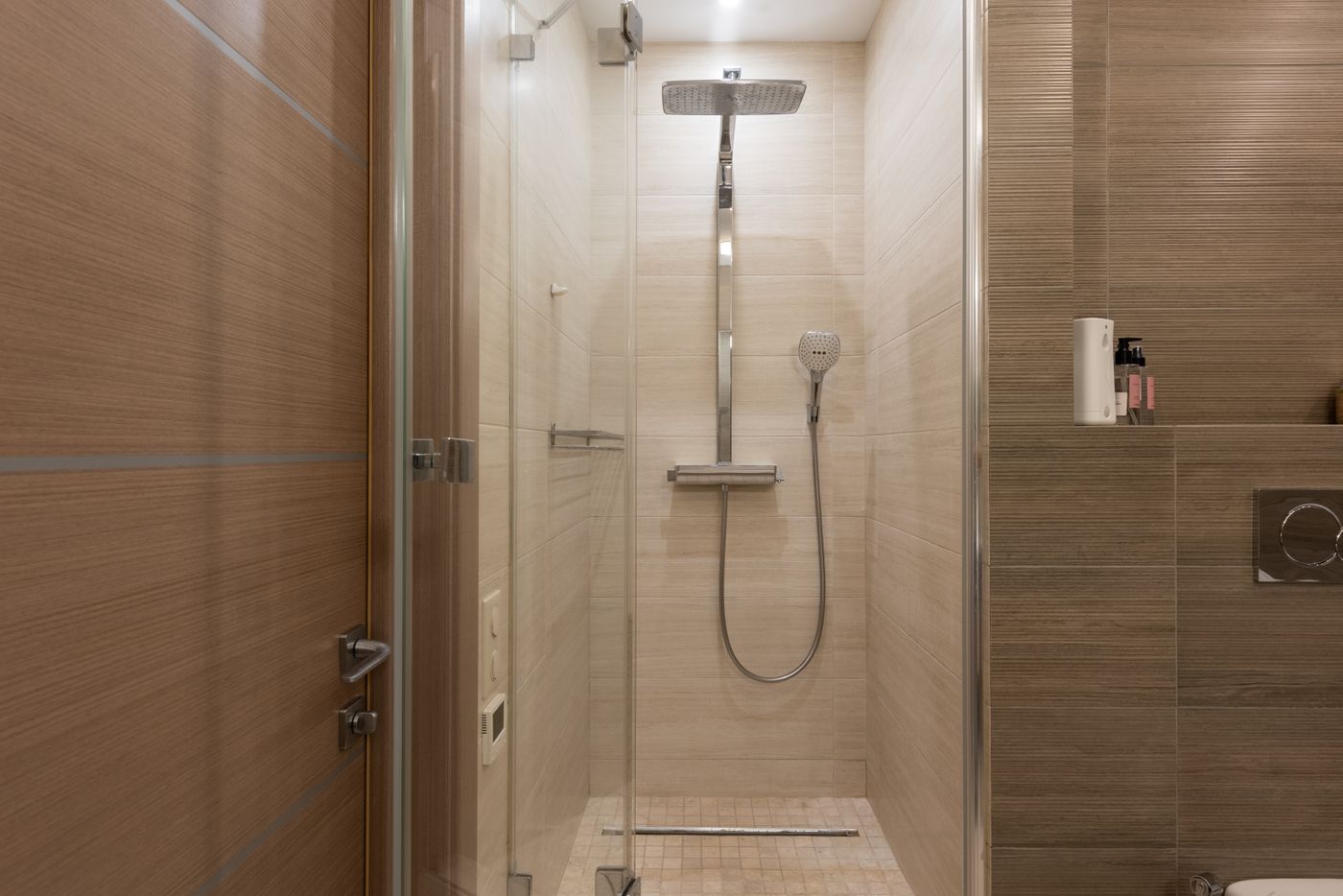 Modern shower cabin with glass door