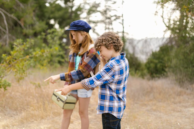 A Boy And Girl Wearing Plaid Long Sleeves