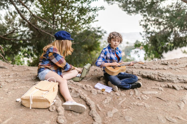 A Boy And Girl Doing Picnic Together 