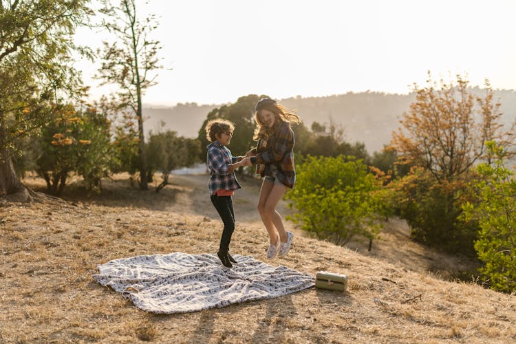 Happy Kids Jumping Together