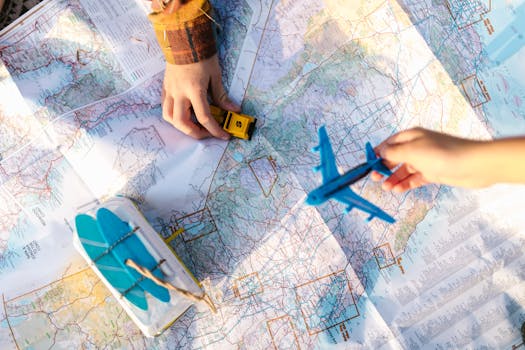 Hands holding a toy airplane and car over a map, symbolizing travel planning and exploration.