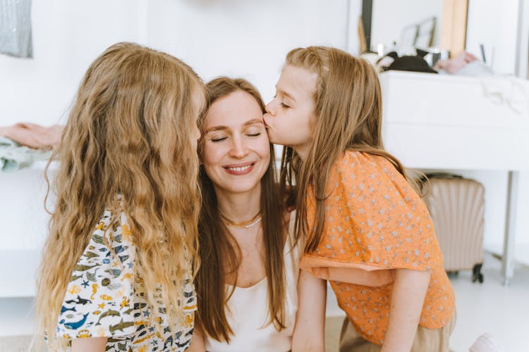 Two Girls Kissing A Woman