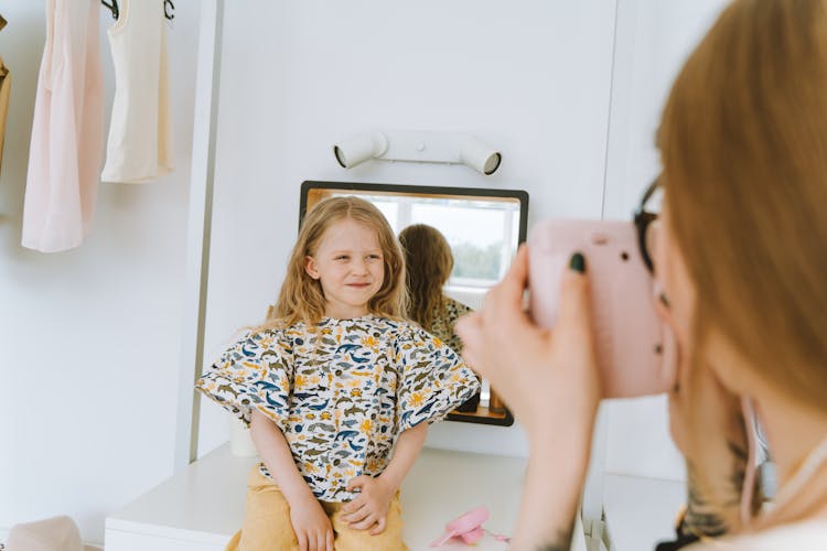 Girl Smiling At A Camera