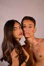 Topless Man and Woman Taking Selfie