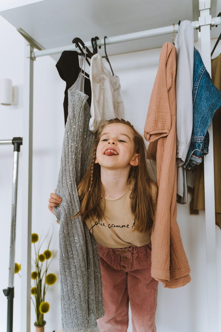 Photograph Of A Kid Teasing