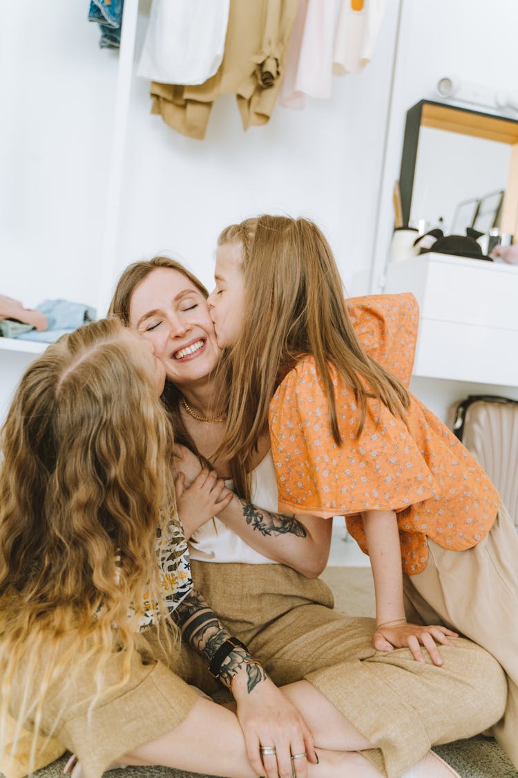 Girls Kissing A Woman