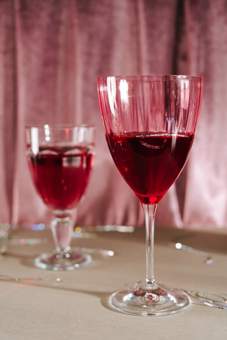 Photograph Of Glasses With Red Liquid