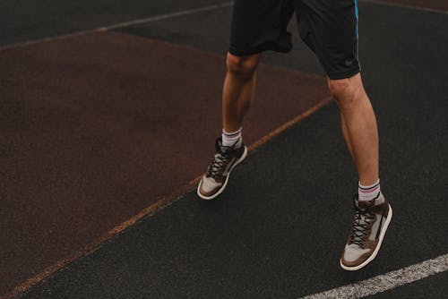 A Man Wearing a Basketball Sneakers