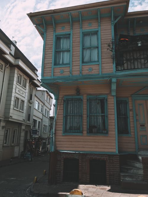 Free Facade of shabby wooden residential house located in alley of old city district Stock Photo