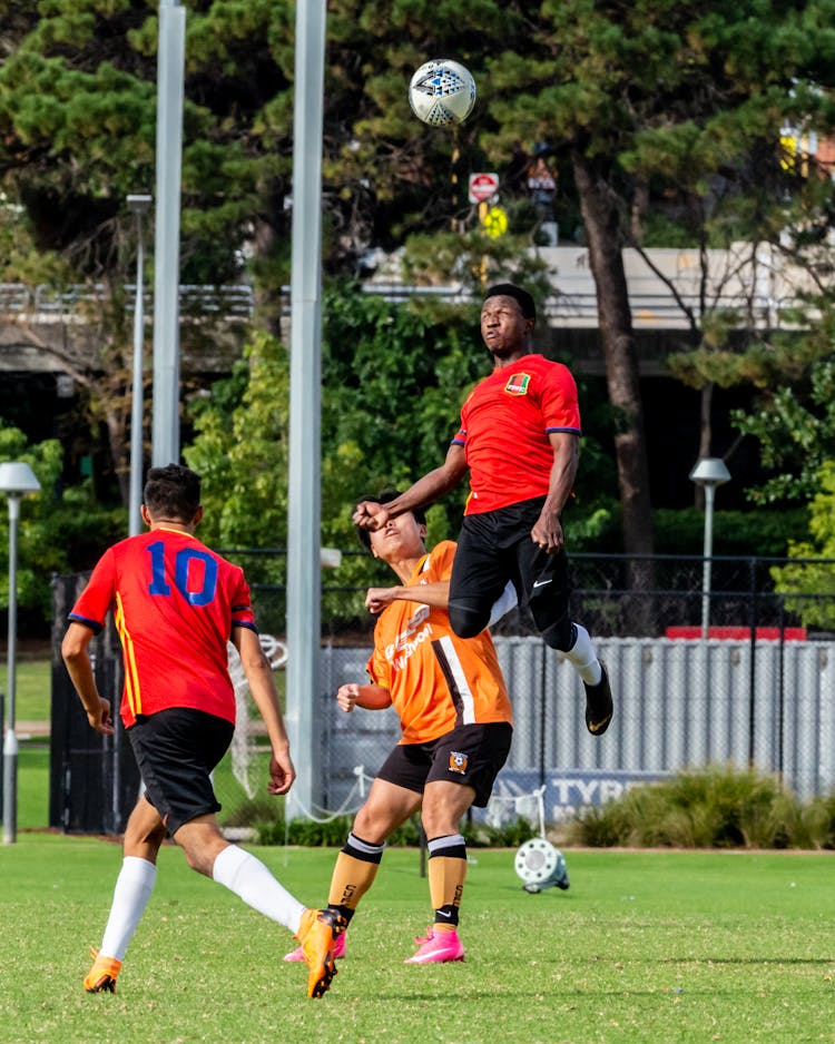 Soccer Player Heading The Ball