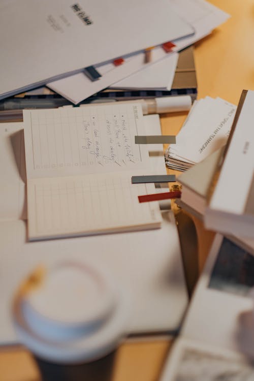 Documents and Notebook on the Work Desk · Free Stock Photo