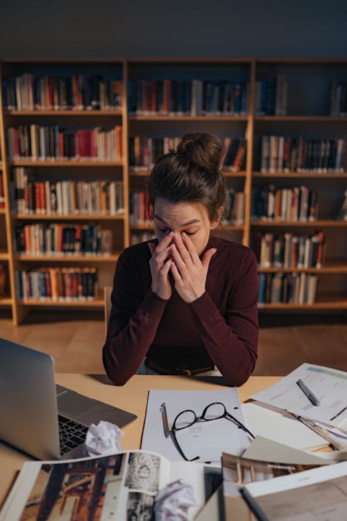 Tired Woman in the Library