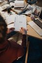 Person Holding White Printer Paper