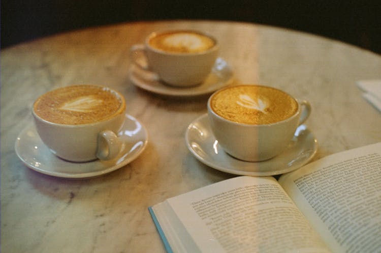 Coffee Cups Near Book In Turkish