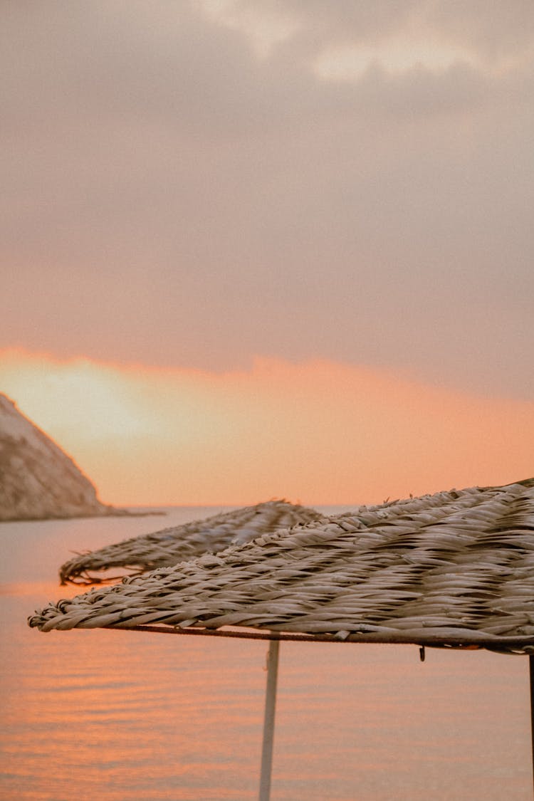 Straw Umbrella On The Beach