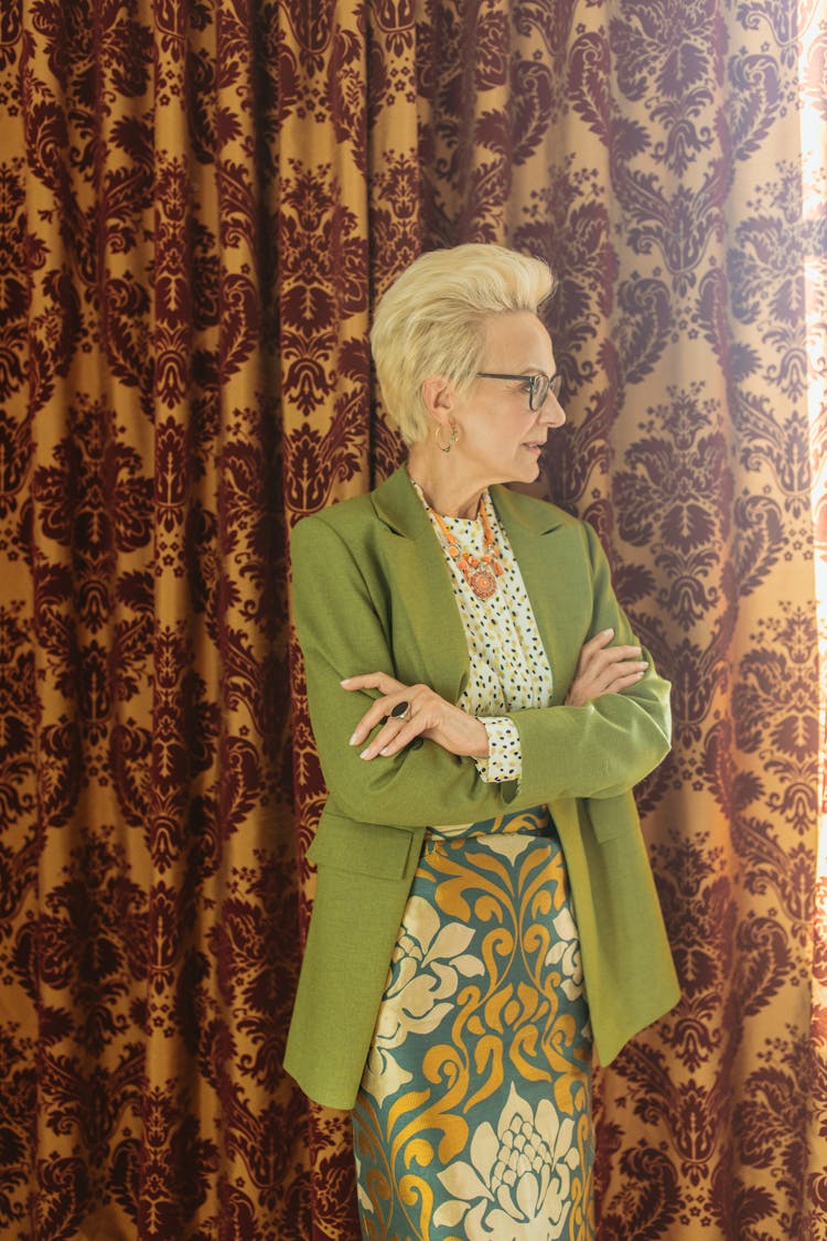 Elderly Woman Wearing Green Blazer