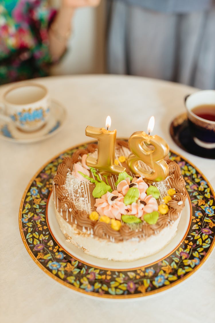 White And Brown Cake With Candles