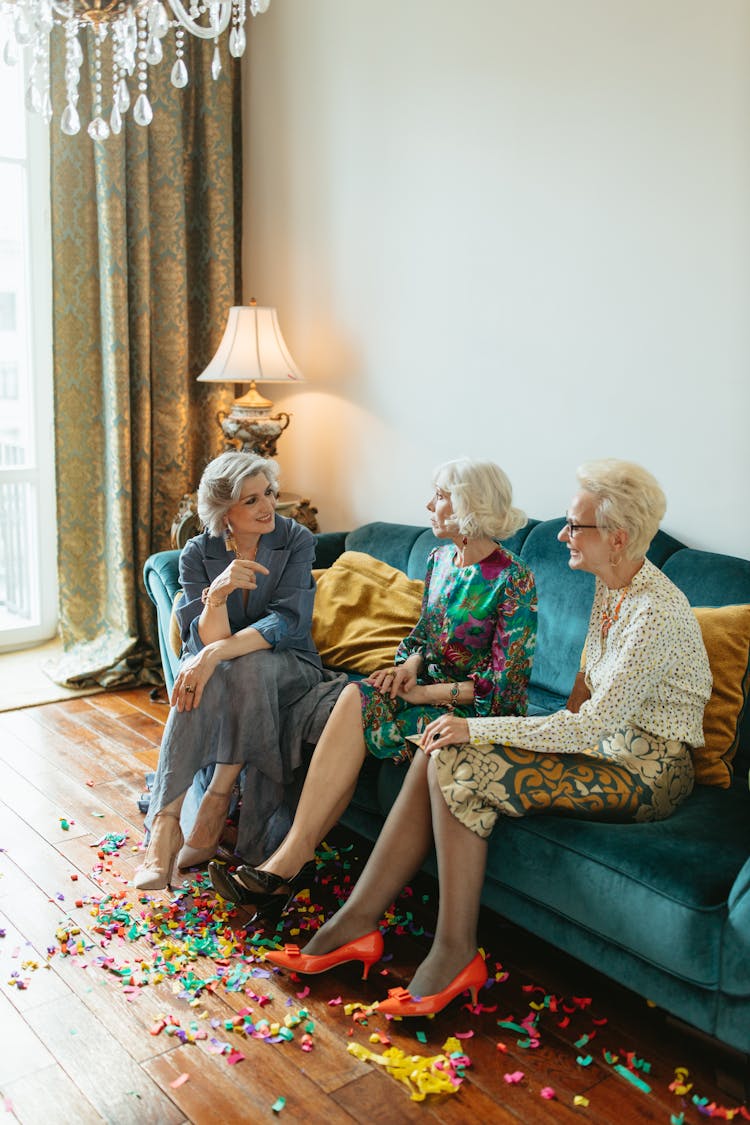 Elderly Women Sitting On Couch While Talking 