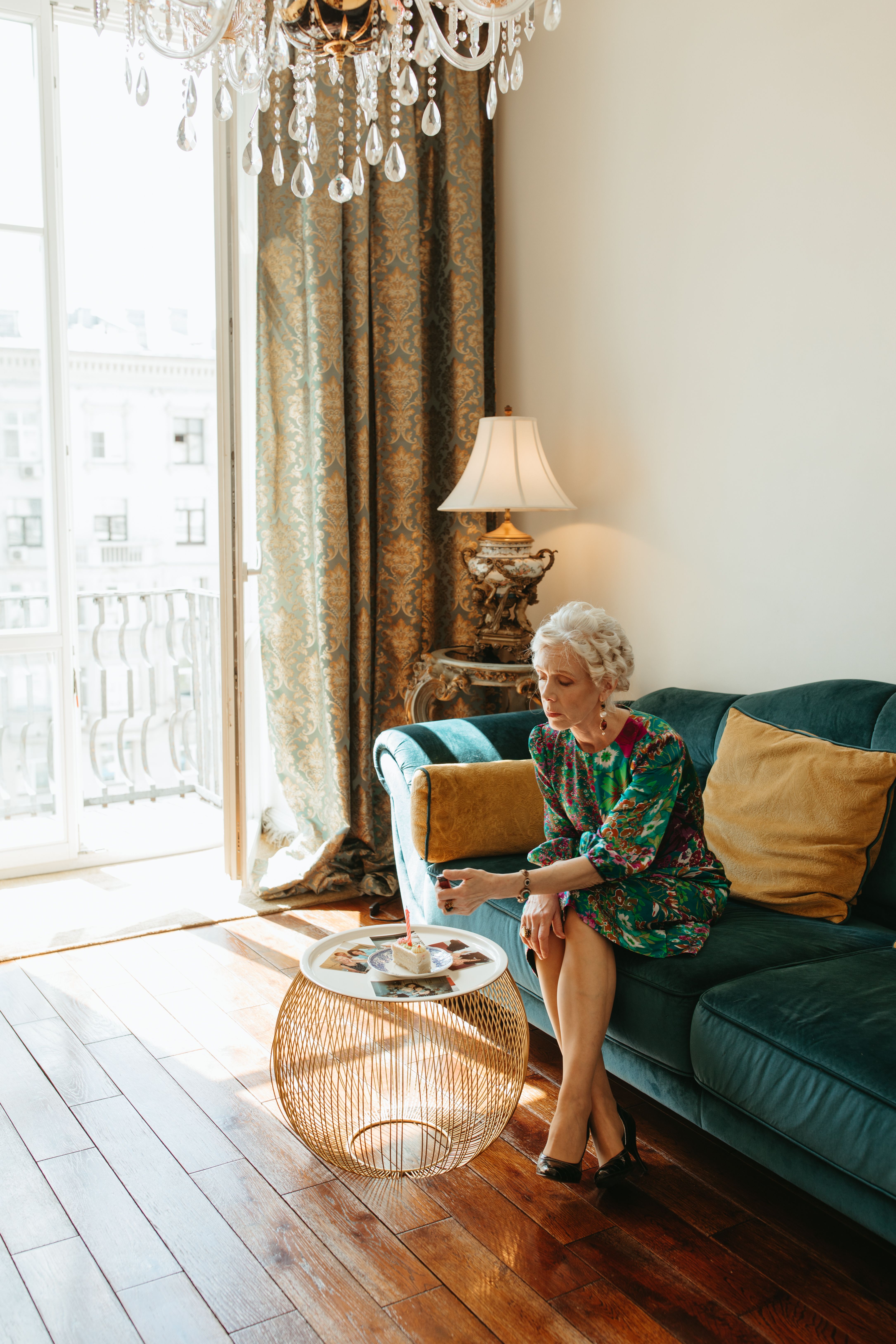 Elderly Woman Looking at Her Vintage Photos · Free Stock Photo