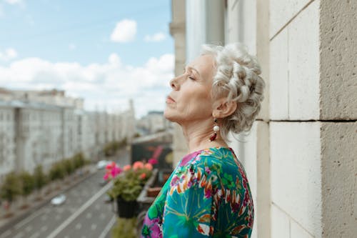 Closed Eyes Elderly Woman Wearing Earring