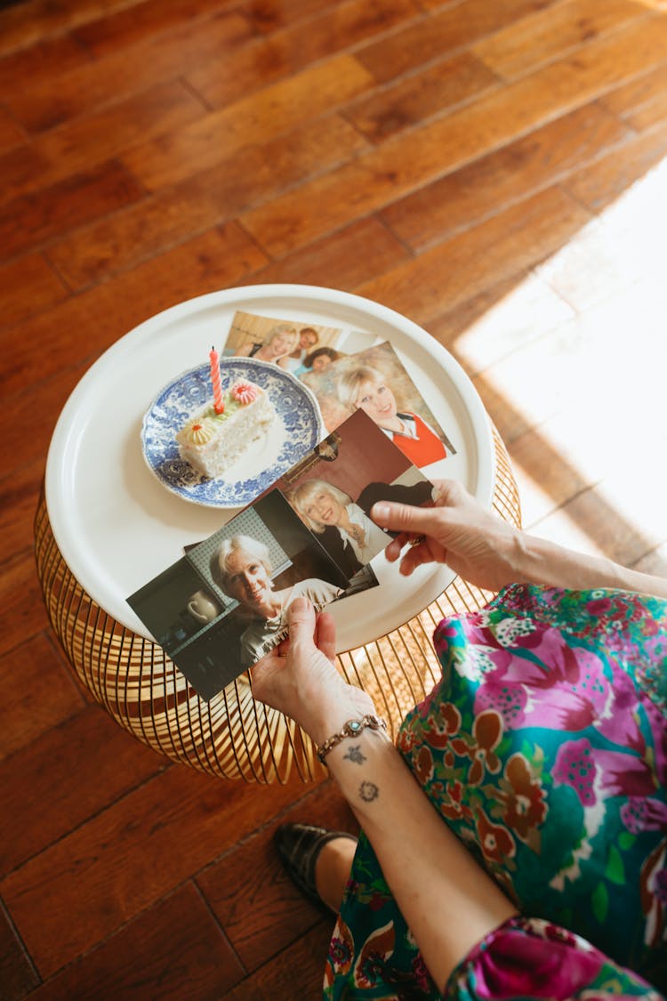 Woman Looking At Photos