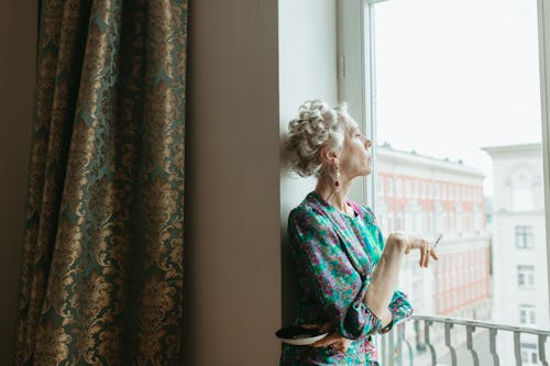 Elderly Woman Smoking Cigarette