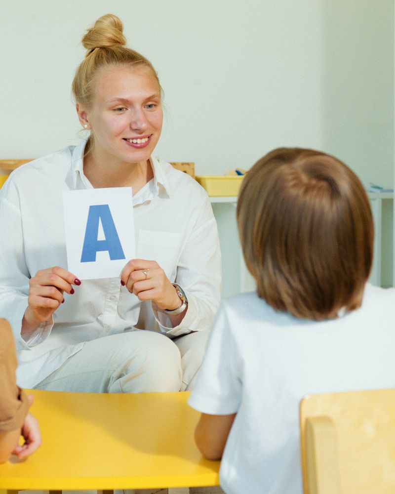 Teacher engaging with young children