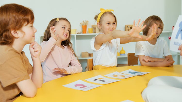 Students Listening To Their Teacher 