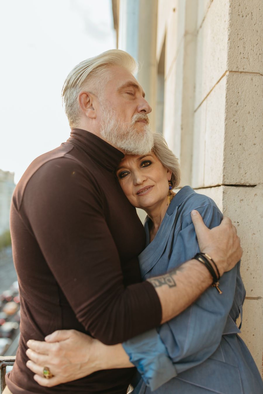 Happy reunited couple, man and woman embracing in New York