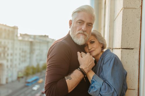 Free A senior couple embracing tenderly outdoors, showcasing love and connection. Stock Photo