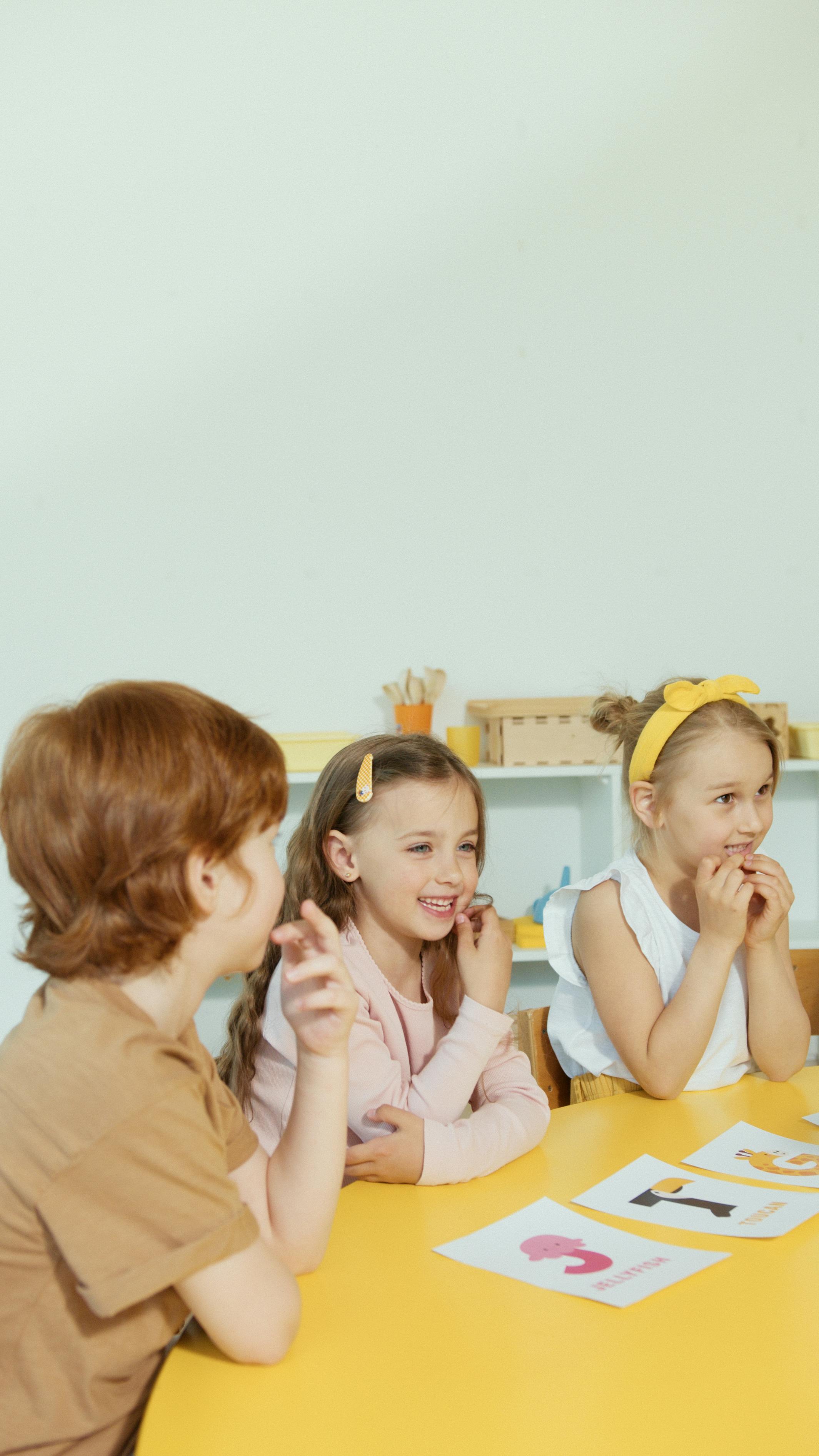 children sitting on the chair