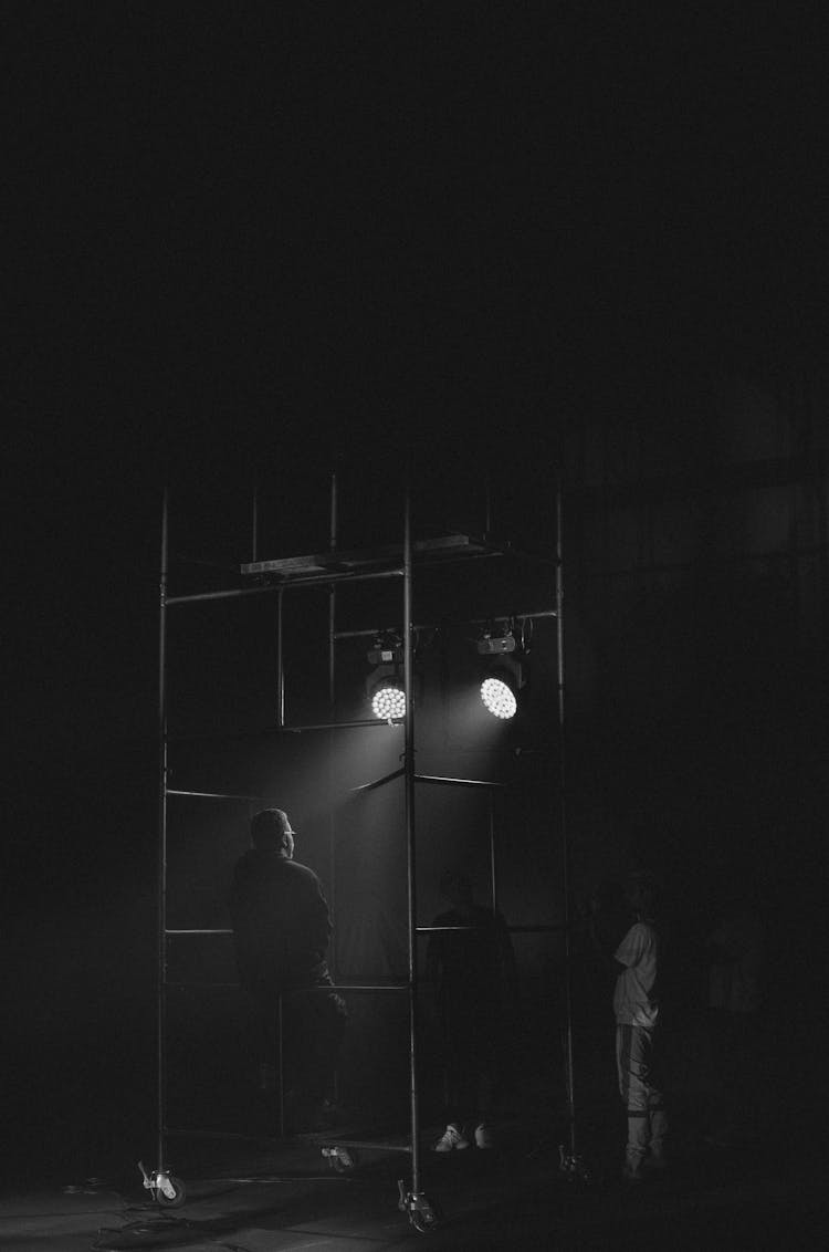 Dark Room With Scaffolding And Spotlight