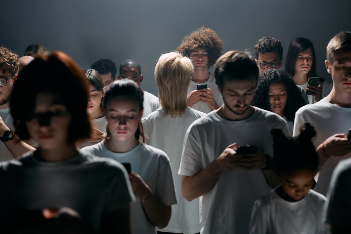 Free Photo of People Using their Smartphones Stock Photo