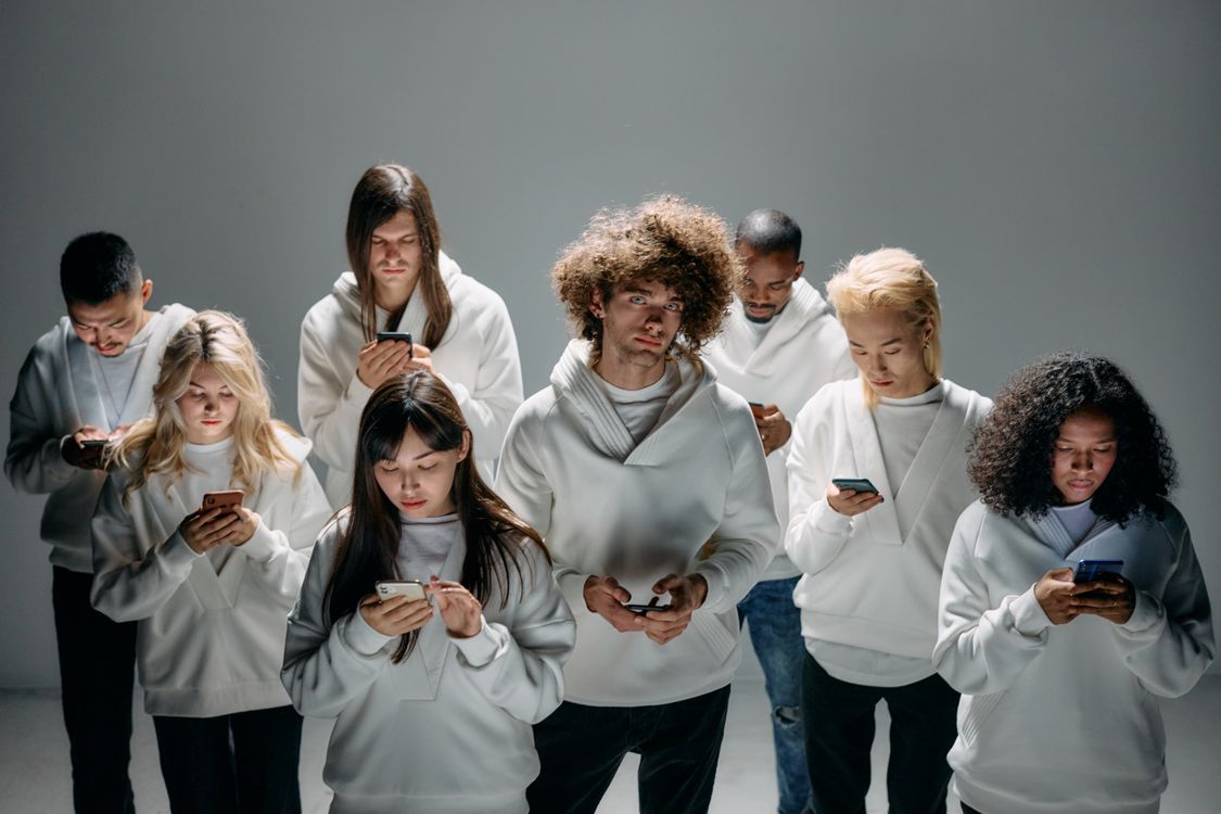 Group of People Standing Using their Phones · Free Stock Photo