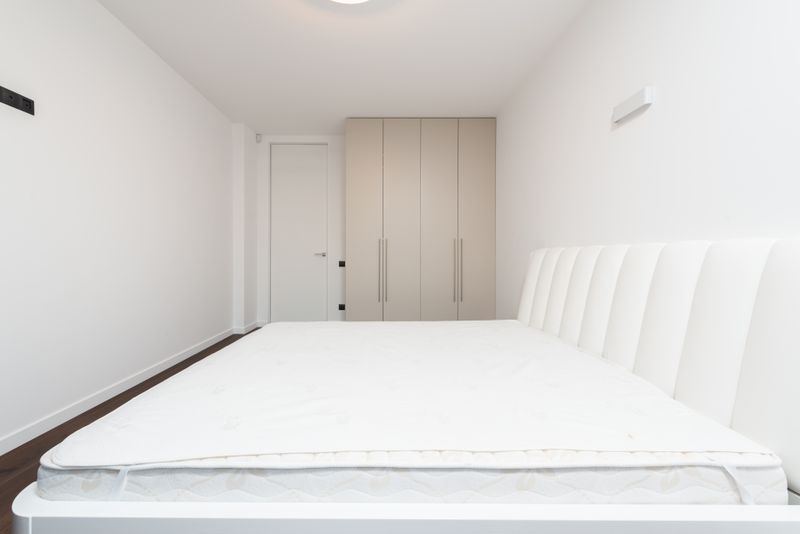 Freshly cleared bedroom after old mattress removal in Sacramento