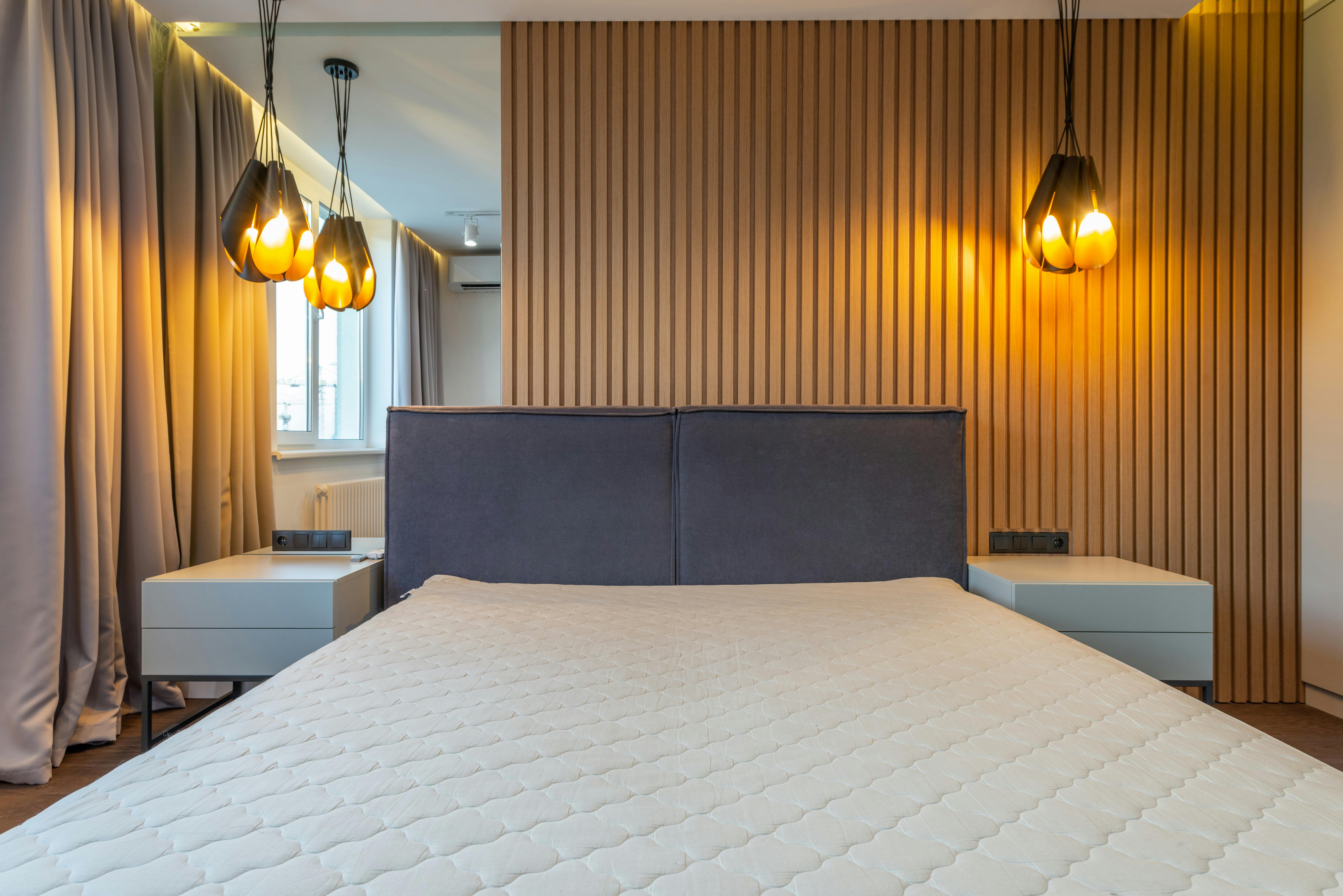 Bedroom With Hanging Dim Lights · Free Stock Photo