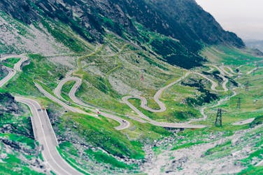 Aerial Photo of Green Scenery and Winding Road somewhere in Romania