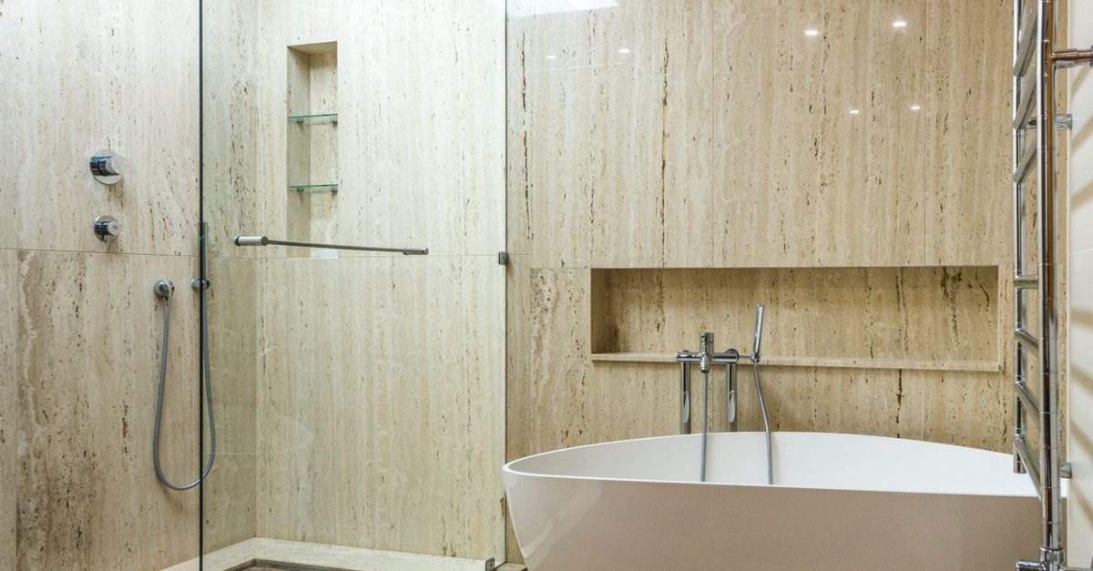 Shower to tub conversion with freestanding soaking tub